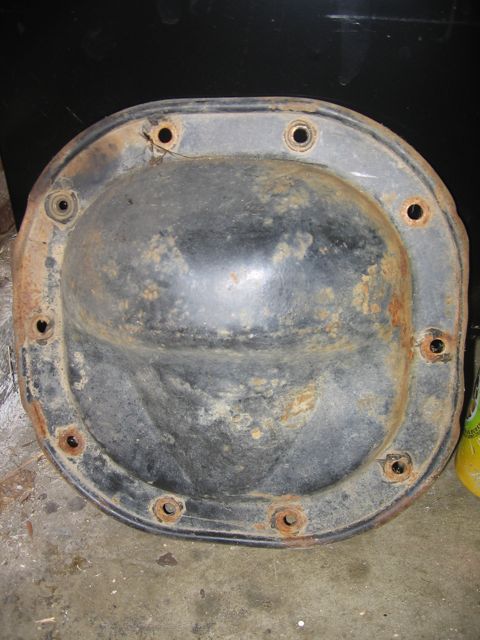 1989 Ford Bronco - A rusty differential cover is shown, likely a replacement part.