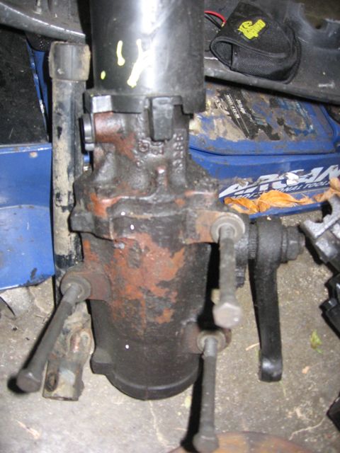 1989 Ford Bronco - A close-up view of a worn steering gear box, likely from an older vehicle, with visible rust and grime.