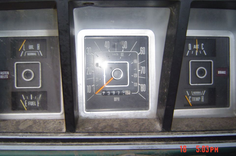 1978 Ford F-350 dashboard with speedometer, fuel gauge, oil pressure gauge, and temperature gauge