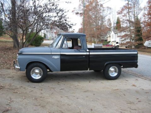 1966 Ford F-100 - This pickup truck appears to be a 1965 Ford F-100, not a 1966 model as claimed.