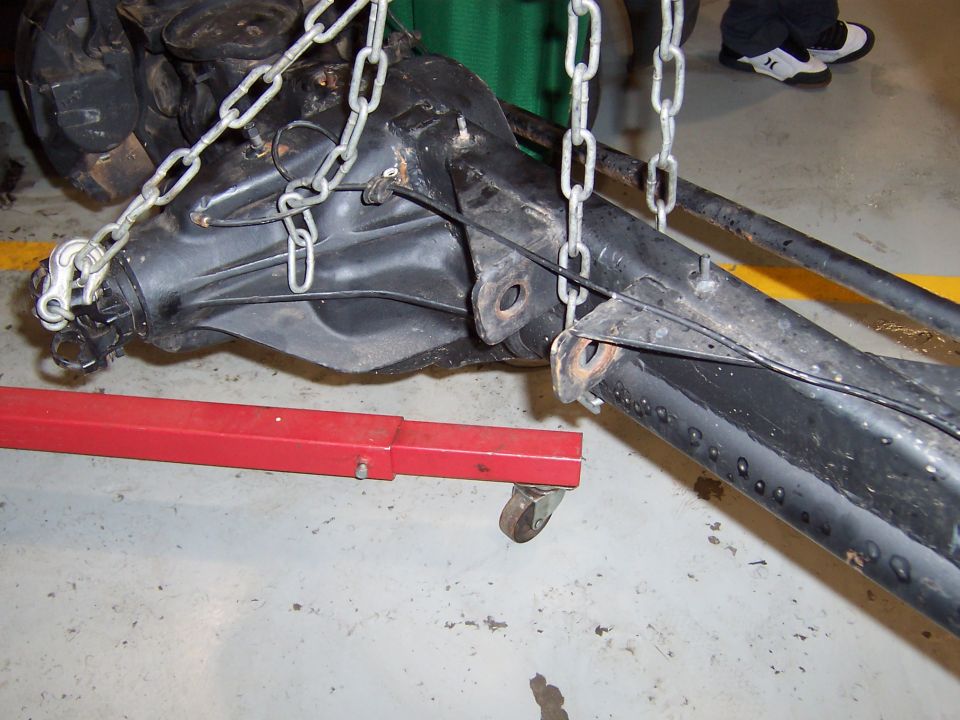 Dana 60 front axle assembly suspended by chains