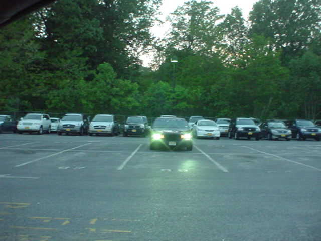 Front view of a 1994 Lincoln Town Car parked in a lot