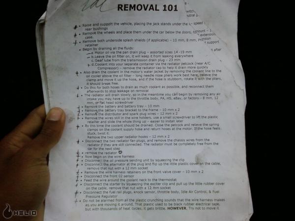 Handwritten-marked "Removal 101" checklist of fluid draining, radiator and wire harness removal steps