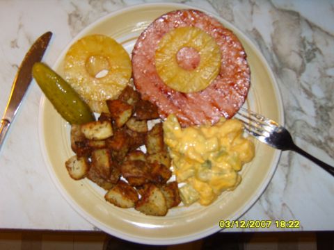 1989 Ford Bronco - A meal ham, pineapple, potatoes, and macaroni salad is ready to be eaten.