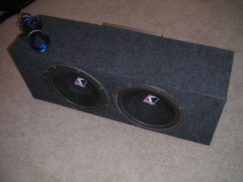 1994 Ford Bronco - Carpeted enclosure with two Kicker subwoofers and speaker wire.