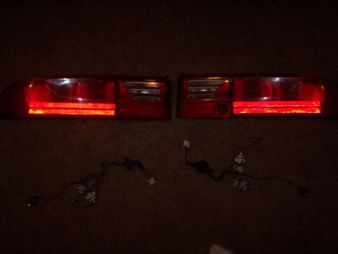 1994 Ford Probe - Pair of car tail lights, likely for a sedan, shown with their wiring.
