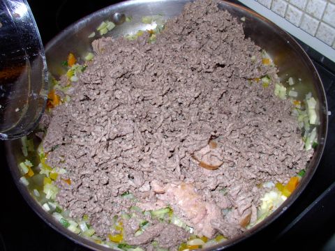 1986 Ford Bronco - The now dry and fat free beef gets dumped in too.