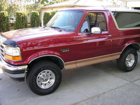 1994 Ford Bronco - This 1994 Ford Bronco is shown from the front three-quarter view, parked outside.