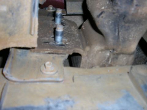 1994 Ford Bronco - First step is to take the bumper off. There are two bolts on each side.