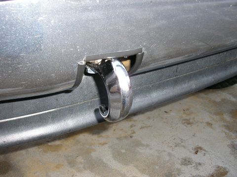 1994 Ford Bronco - Tow hook installation on a vehicle bumper.