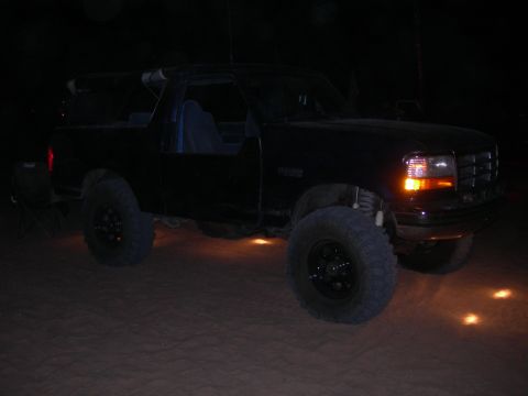 1994 Ford Bronco - This 1994 Ford Bronco is equipped with large off-road tires and underglow lighting.