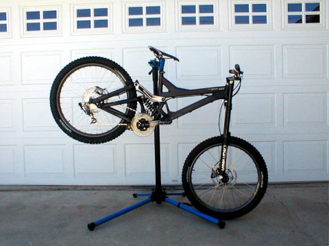 1996 Ford Bronco - Mountain bike on a repair stand, ready for maintenance.