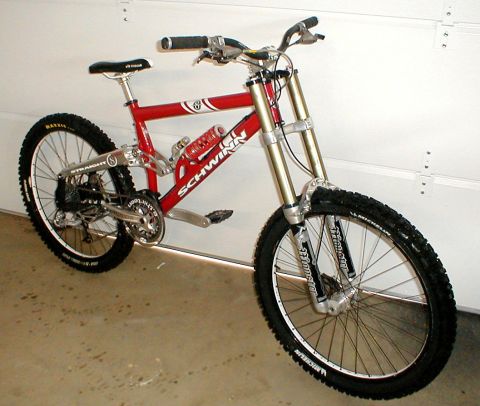 1996 Ford Bronco - A red Schwinn mountain bike is shown in a garage setting.