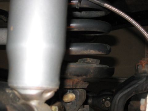 1995 Ford Bronco - lower coil mount and wedge