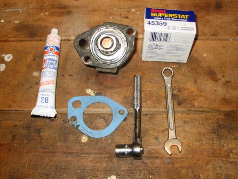 1988 Ford Bronco - Housing with thermostat glued into place. I let it dry overnight.