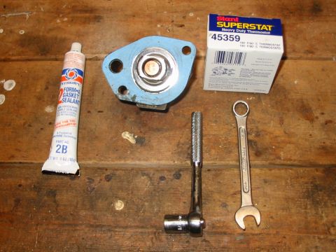 1988 Ford Bronco - This one shows the gasket glued to the top of the thermostat.