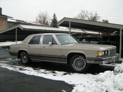 1988 Mercury Grand Marquis - This 1988 Mercury Grand Marquis is seen in a snowy outdoor parking area.