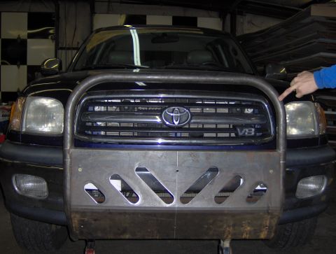 1978 Ford Bronco - A custom brush guard is fitted to the front of a Toyota Tundra, obscuring the grille and headlights.