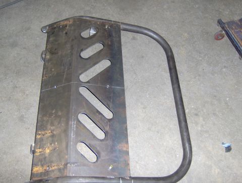 1978 Ford Bronco - A custom metal brush guard is shown, fabricated from steel plates and tubing.