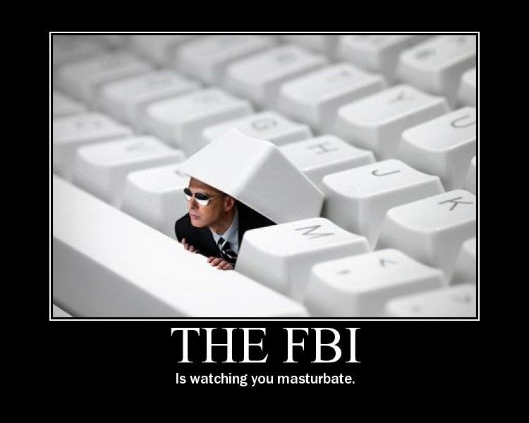 Demotivational poster THE FBI showing a man hiding among keyboard keys