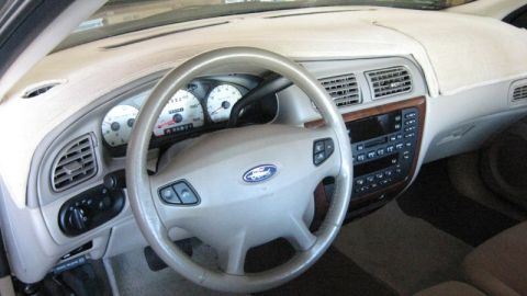 2003 Ford Taurus - Installed a new velour dash mat. Has a cut out for the light sensor on the dash (the hole looks like an afterthought compared to the rest o…
