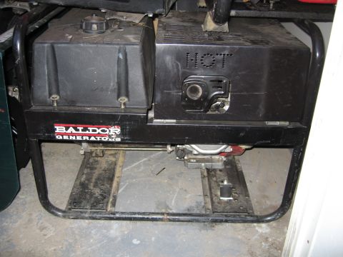 1996 Dodge 2500 - A Baldor Generators portable generator is shown, with a HOT label visible on its casing.