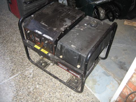 1996 Dodge 2500 - Portable generator with control panel and fuel tank.