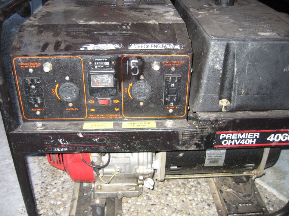 Generator with control panel showing Hobbs meter, circuit breakers, and outlets. Label reads PREMIER OHV40H 4000
