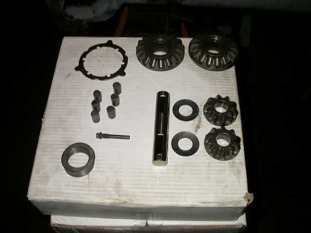 E-locker rebuild kit.  Contains engagement pins, pin retainer, side gears, spiders, cross pin, cross pin retainer bolt, side gear washers and shims.