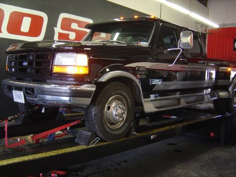 1996 Ford F-250 - This F-350 pickup truck is positioned on a dynamometer for testing.