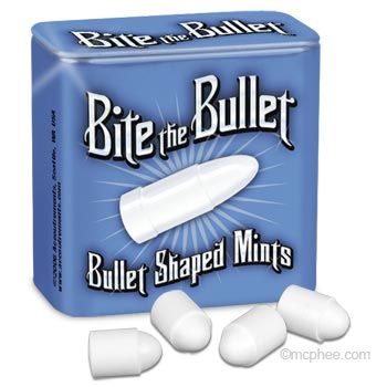 1989 Ford Bronco - A blue tin labeled 'Bite the Bullet' contains bullet-shaped mints, with several scattered outside.