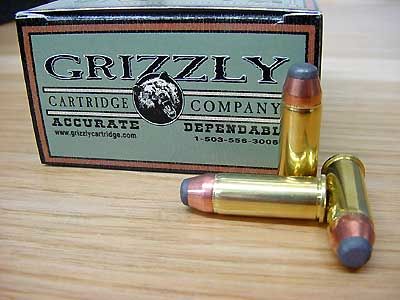 1989 Ford Bronco - A box of Grizzly Cartridge Company ammunition is shown with three cartridges in the foreground.