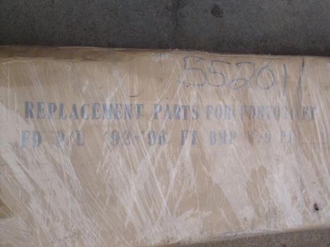 1995 Ford C-150 (Centurion Conversions) - A box with "REPLACEMENT PARTS FOR 93-96 F150/F250/F350" printed on it.
