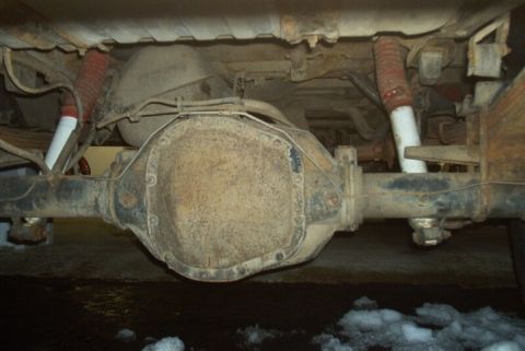 1991 Ford F-250 - Underside view of a 1991 Ford F-250's rear axle and suspension system.