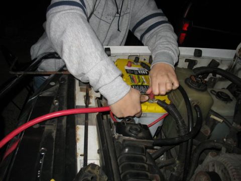 1995 Ford C-350 (Centurion Conversions) - Connecting jumper cables to a yellow Optima battery.