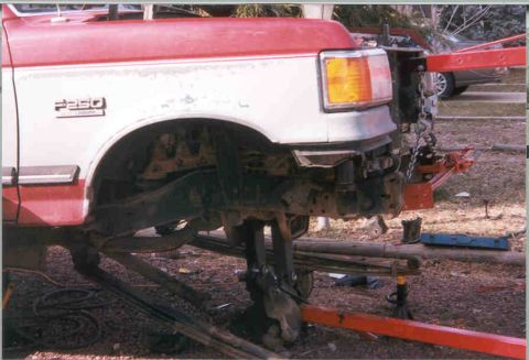 1991 Ford F-250 - Front view of a 1991 Ford F-250 truck, showing the fender and suspension system.