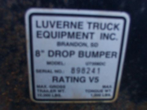 1995 Ford C-350 (Centurion Conversions) - A label details a Luverne Truck Equipment Inc. 8" drop bumper with its model and serial numbers.