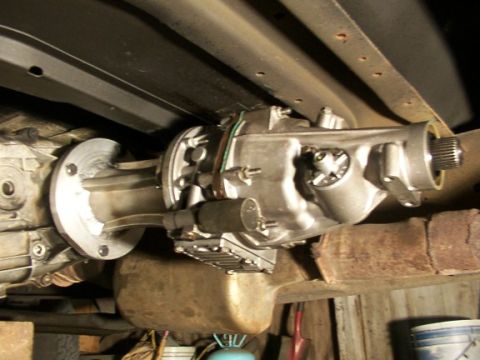1995 Ford C-350 (Centurion Conversions) - Close-up view of a Gear Vendors overdrive unit installed on a vehicle's transmission.