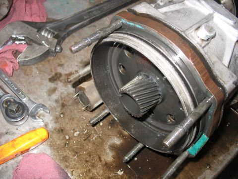 1995 Ford C-350 (Centurion Conversions) - A Gear Vendor overdrive unit, likely undergoing maintenance, is shown with its splined shaft and mounting hardware visible.