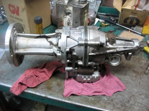 1995 Ford C-350 (Centurion Conversions) - A Gear Vendors overdrive unit sits on a workbench, likely for repair or installation.