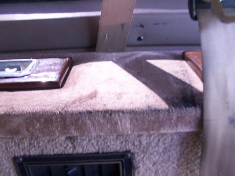 1995 Ford C-350 (Centurion Conversions) - Interior view of a vehicle's dashboard and overhead trim.