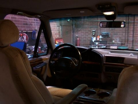 1995 Ford C-350 (Centurion Conversions) - The interior of a van, likely from the early to mid-1990s, is shown from the passenger seat.