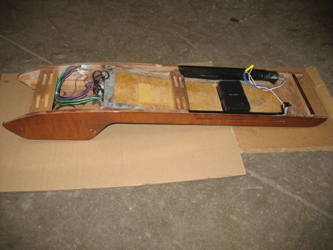 1995 Ford C-350 (Centurion Conversions) - An overhead console part, likely from a vehicle, is shown with its internal wiring and electronic components exposed.
