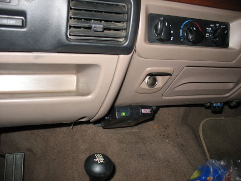 1995 Ford C-350 (Centurion Conversions) - Interior view of dashboard and trailer brake controller installation.