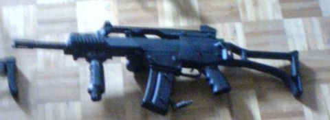 1985 Ford Bronco - This is a photo of an assault rifle, not a 1985 Ford Bronco.