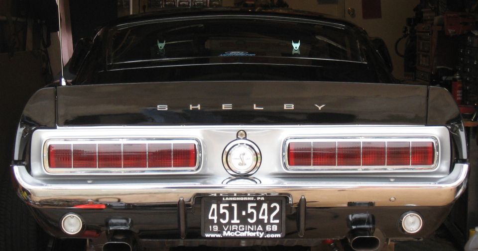 Rear of a black 1968 Shelby GT500 with Shelby badging and a Pennsylvania license plate
