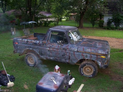 1979 Ford Bronco - This heavily rusted 1979 Ford Bronco pickup truck has a '$50' sign on its windshield.
