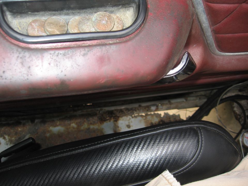 Interior door panel with coins in armrest storage, 1979 Ford F-150