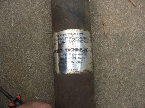 1995 Ford C-350 (Centurion Conversions) - A driveshaft with a label indicating it was dynamically balanced by Action Machine, Inc. of South Bend, Indiana.