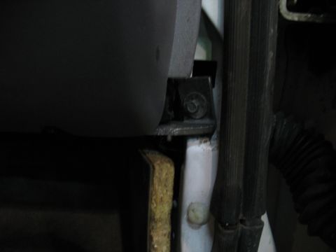1995 Ford C-350 (Centurion Conversions) - Interior mounting bracket detail, possibly for a dash component or trim piece.